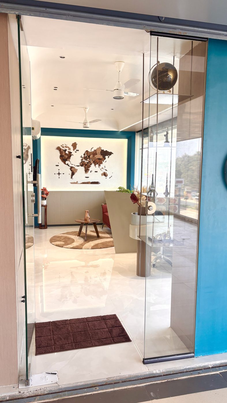 MYTECH Study Abroad entrance with a wooden world-map wall